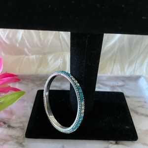 Blue and clear rhinestone silver tone bangle